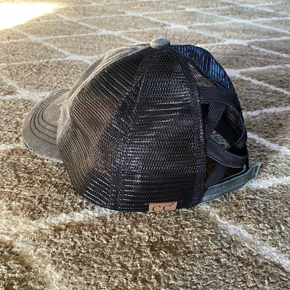 Distressed black criss-cross ponytail baseball hat